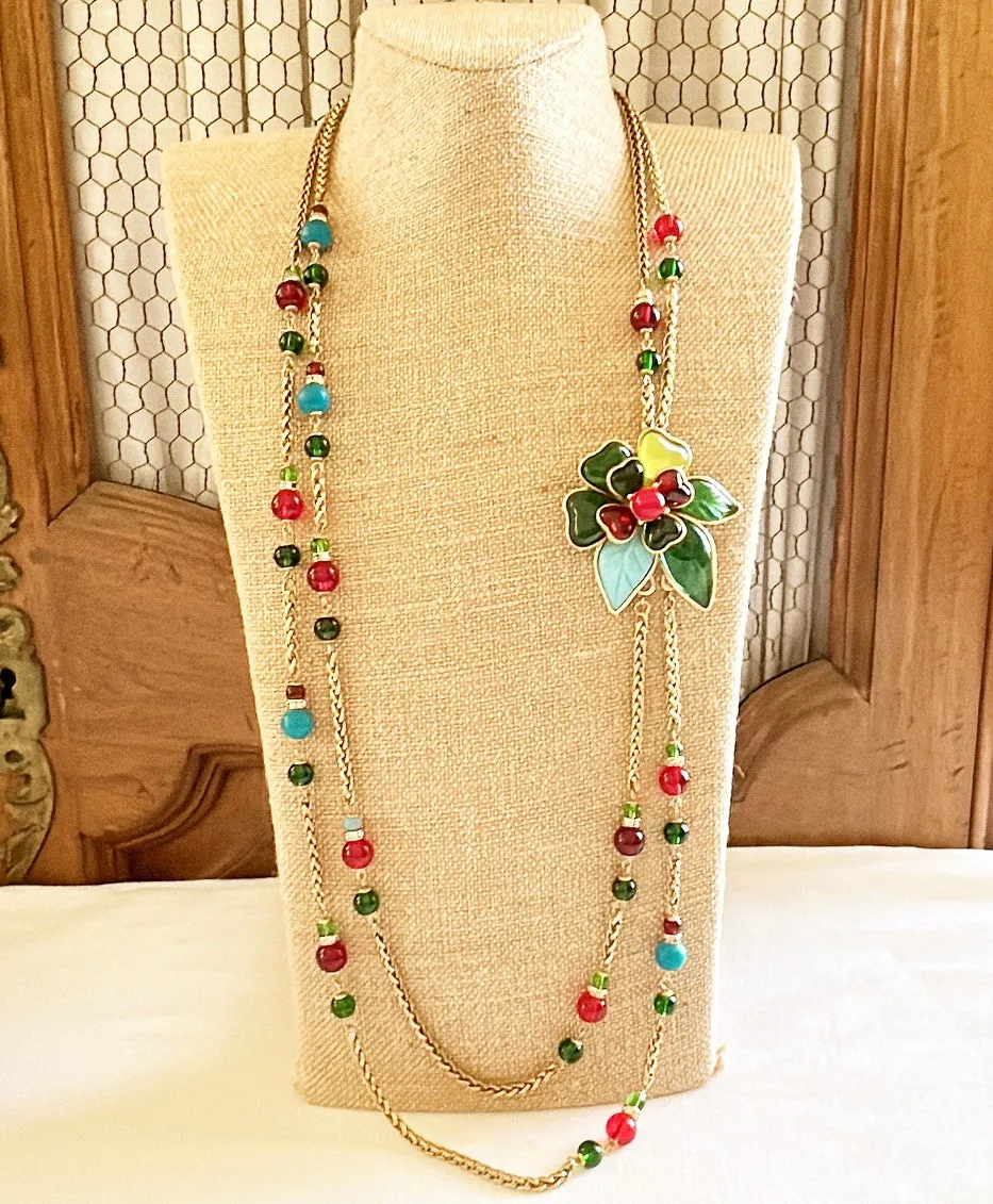 Beautiful statement necklace with large flower style attached pendant.