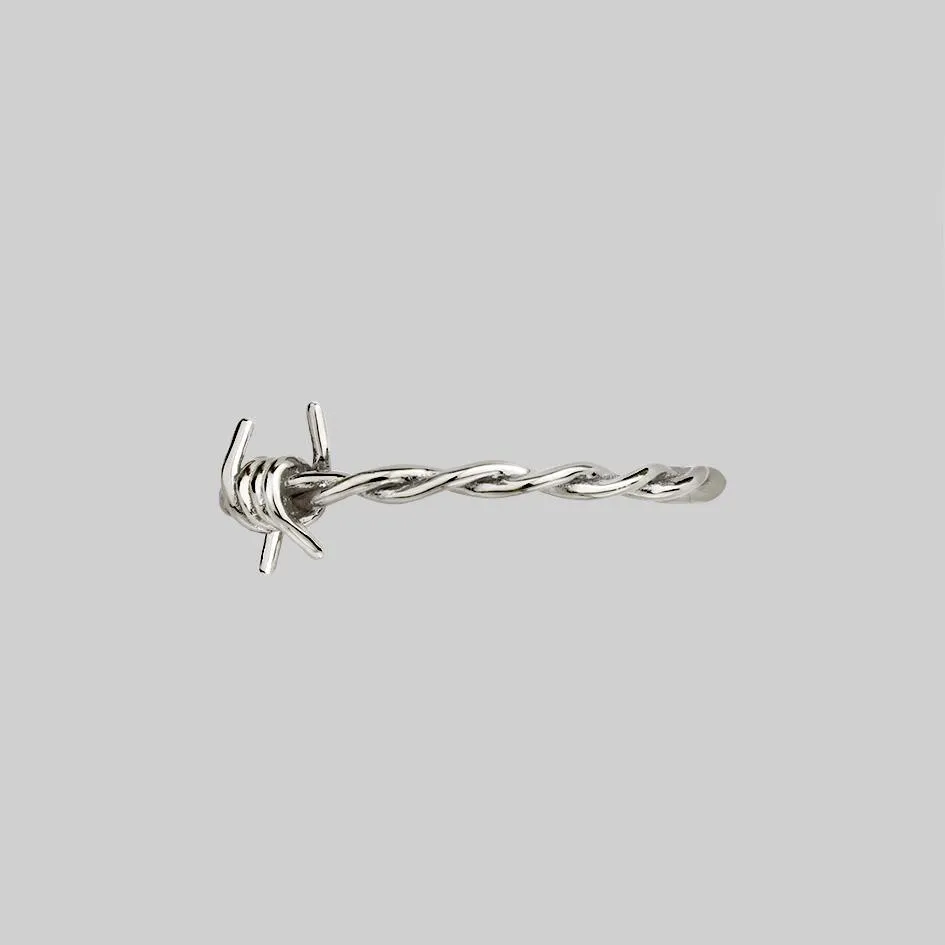 SURVIVAL. Symbolic Barbed Wire Ring - Silver